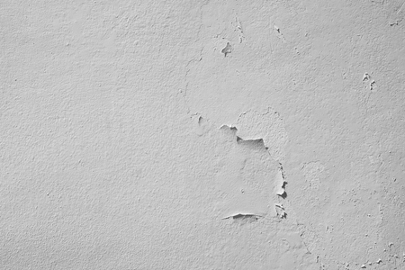 white wall with crack texture bckgroundの写真素材