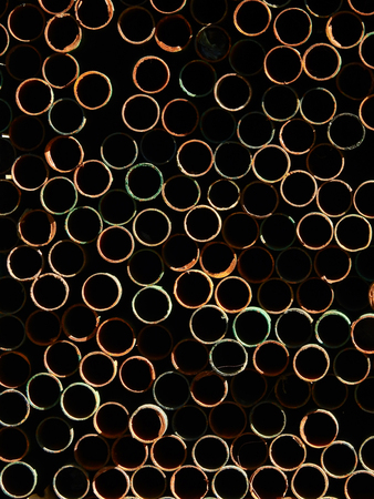 pile of old steel tube with rust in construction site