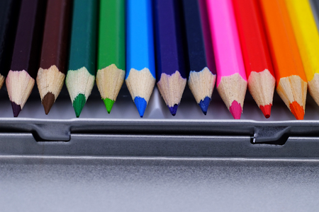 closeup colored pencils in aluminum boxの写真素材