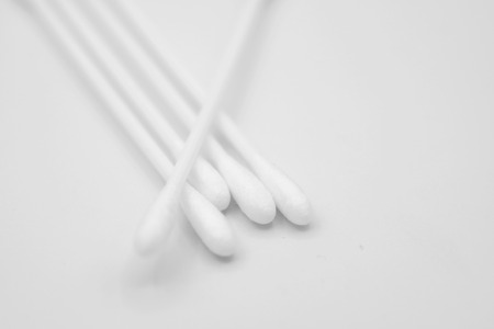 Cotton bud on white backgroundの写真素材
