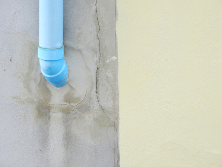 pipe on old concrete wall 