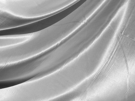 white fabric silk crumpled textureの写真素材