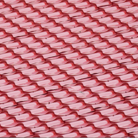 pink tile roof patternの写真素材