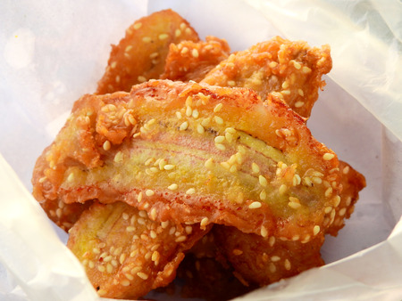Thai snack fried banana in plastic bag, Thailand street foodの写真素材
