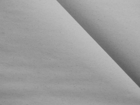gray sheet of paper folded textureの写真素材