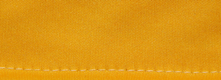 Gold thread on the fabric textureの写真素材