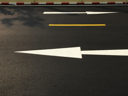 asphalt road with arrow and line texture