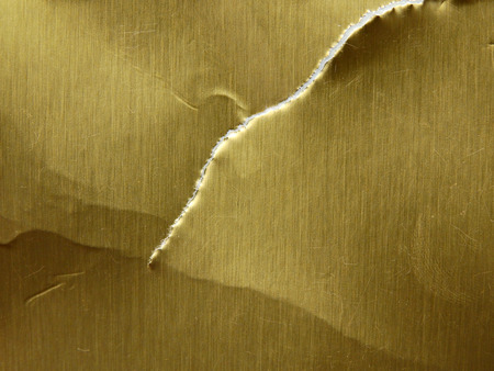 torn gold paper texture, crumpled paperの写真素材