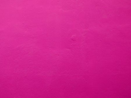 pink paint wall texture backgroundの写真素材