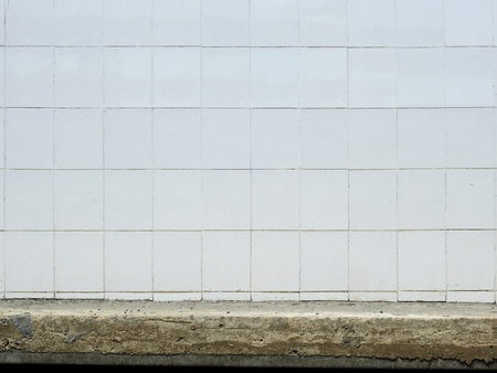 aged street tile wall backgroundの写真素材