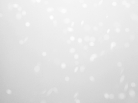 bokeh of light on white backgroundの写真素材