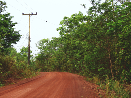 red dirt road in countrysideの写真素材