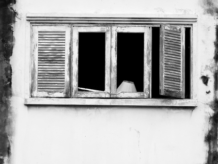 old wood window on the wall black and white styleの写真素材