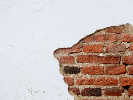old white wall with crack, structure of the brickの写真素材