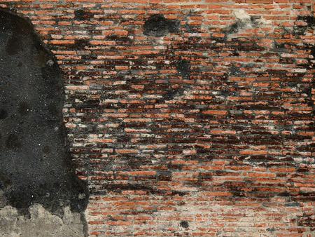 cracked concrete vintage brick wall backgroundの写真素材