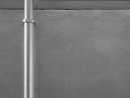 pipe on gray wall background