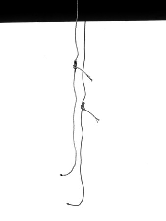 rope with shadow on the wall minimalism style, black and white