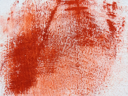 brown paint on white wall textureの写真素材