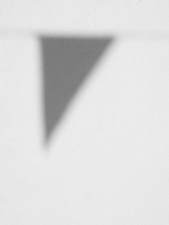 shadow of flag on white wall backgroundの写真素材