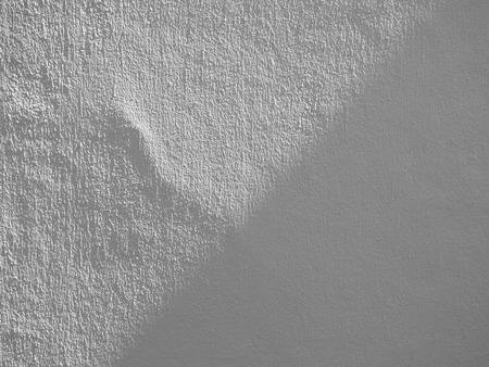 shadow on white wall with light coming from the windowの写真素材