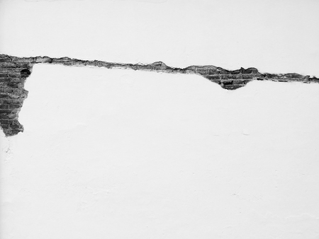 earthquake effect crack concrete brick wall background black and white styleの写真素材