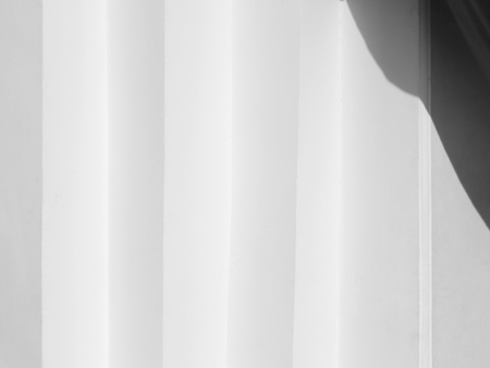 white wall with shadow backgroundの写真素材