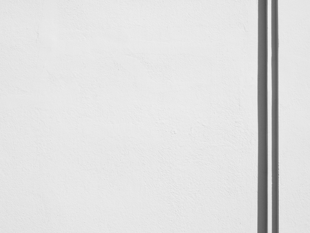 white wall with shadow backgroundの写真素材