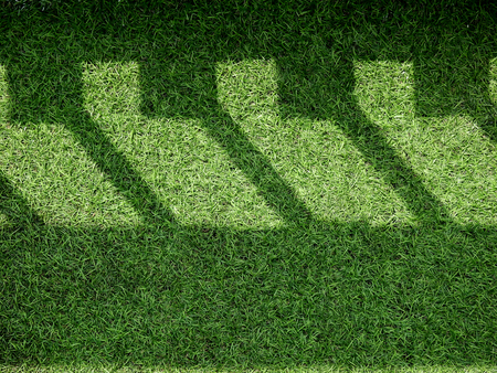 artificial grass floor with shadow textureの写真素材