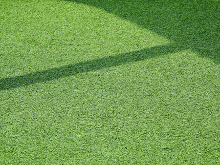 artificial grass floor with shadow textureの写真素材