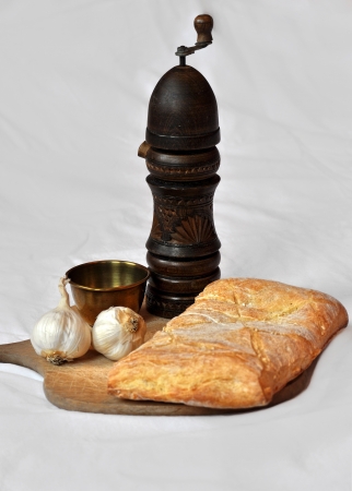 Fresh bread,garlic and pepper millの写真素材