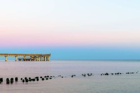 A wooden pier of the city Zelenogradsk in the Baltic sea