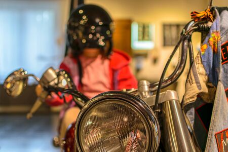 RUSSIA, KALININGRAD REGION, ZELENOGRADSK, - August 2016: the Museum of skulls and skeletons in hotel and entertainment centre Paradox in Zelenogradsk. Girl on a motorcycleのeditorial素材