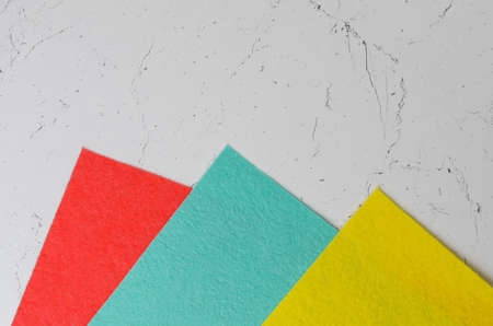 Mocap of colorful napkins on the textured surface of the table