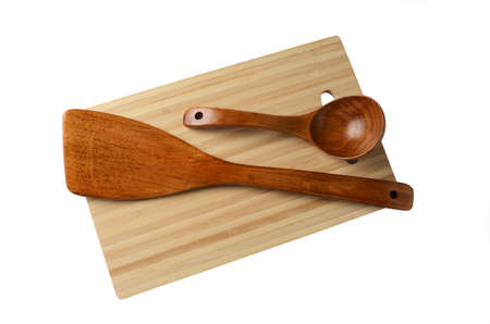 Wooden eco-friendly tableware. Wooden spoon, cutting board, spatula.の写真素材