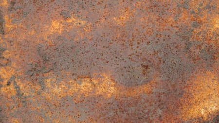 The texture of a rusty metal surface covered with dirt and multicolored rust. Background.
