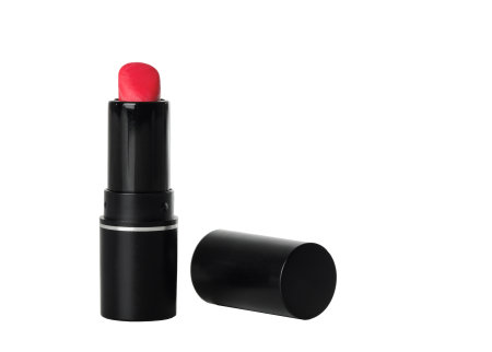 Womens lipstick of scarlet color in a black case.の写真素材