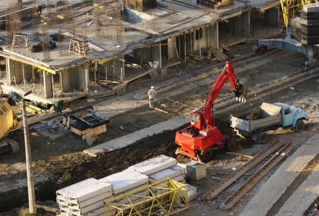 Construction site. View of the working excavator.の写真素材