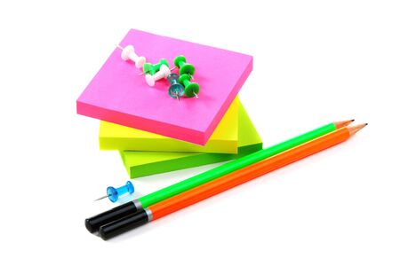 Note paper and pencils on white background の写真素材