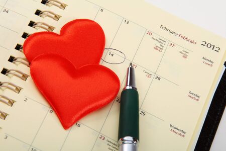 Valentine's Day marked the calendar with two red hearts.の写真素材