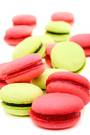 Colorful french macaroons on a white background の写真素材