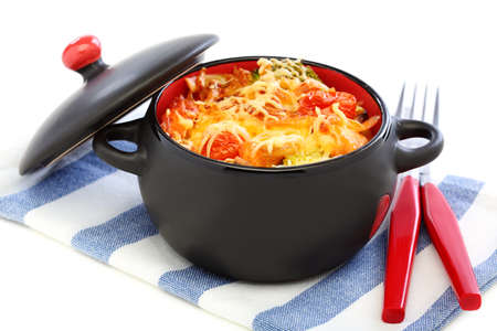 Casserole of pasta, broccoli and cheese in a black pot の写真素材