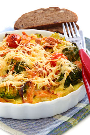 Casserole with vegetables and cheese in porcelain form  の写真素材