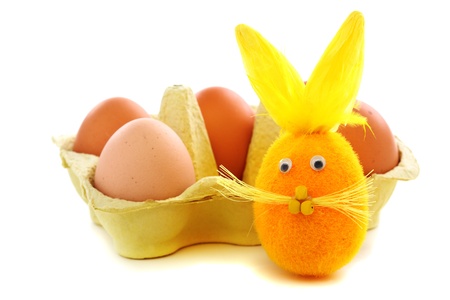 Funny easter bunny and a box of eggs の写真素材