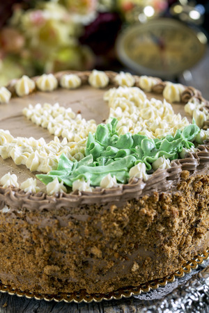 Festive nut cake with butter cream close up.の写真素材