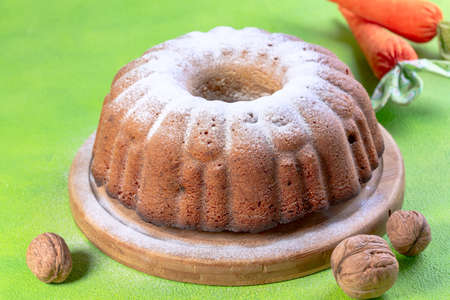 Homemade cottage cheese is served in a wooden bowl with a spoonful of fresh sour cream. Concept of healthy eating. Copy the space.の写真素材