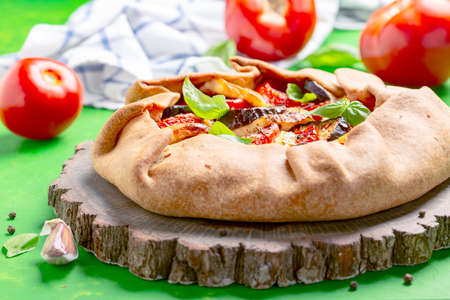 Potatoes with sprouts for planting, scoop with soil on a white background, selective focus. Agricultural concept.の写真素材