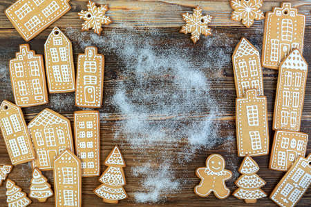 Handmade ginger cookies are decorated with an icing pattern using a pastry bag. Baking festive...