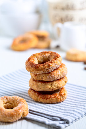 Traditional homemade italian turchetti cookies on a linen napkin, selective focus. Concept of...