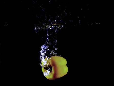 water splash isolated on dark background.の写真素材
