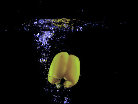 water splash isolated on dark background.の写真素材